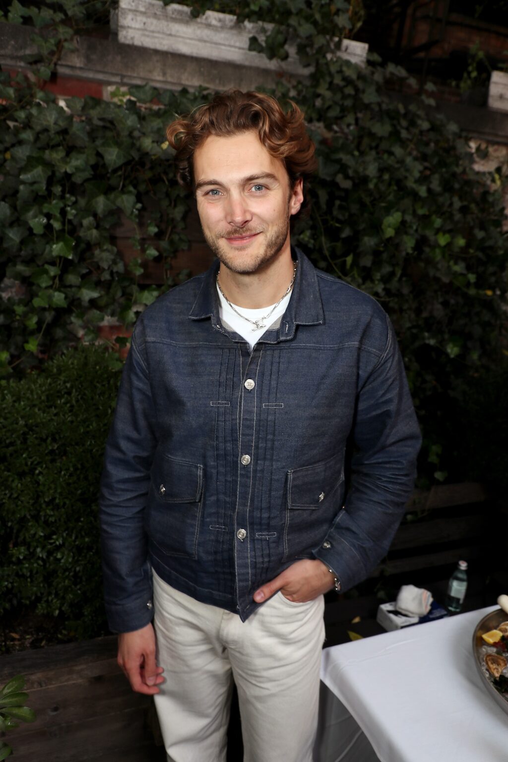 New York, New York - 10/10/25 - Jesse Burgess (host of "Knife Edge: Chasing Michelin Stars") attends A Premiere Celebration for Apple TV+ “Knife Edge: Chasing Michelin Stars” at The Musket Room and COQODAQ in New York CityPicturehouse - PICTURED: Jesse Burgess (host of "Knife Edge: Chasing Michelin Stars") - PHOTO by: Marion Curtis / StarPix for Apple TV+ - Location: The Musket Room and COQODAQ