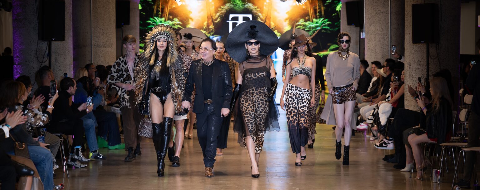 LOS ANGELES, CALIFORNIA - OCTOBER 16: Designer David Tupaz and models walk the runway at the David Tupaz show during Los Angeles Fashion Week Powered By Art Hearts Fashion at The New Mart on October 16, 2025 in Los Angeles, California. (Photo by Mark Gunter/Getty Images for Art Hearts Fashion)