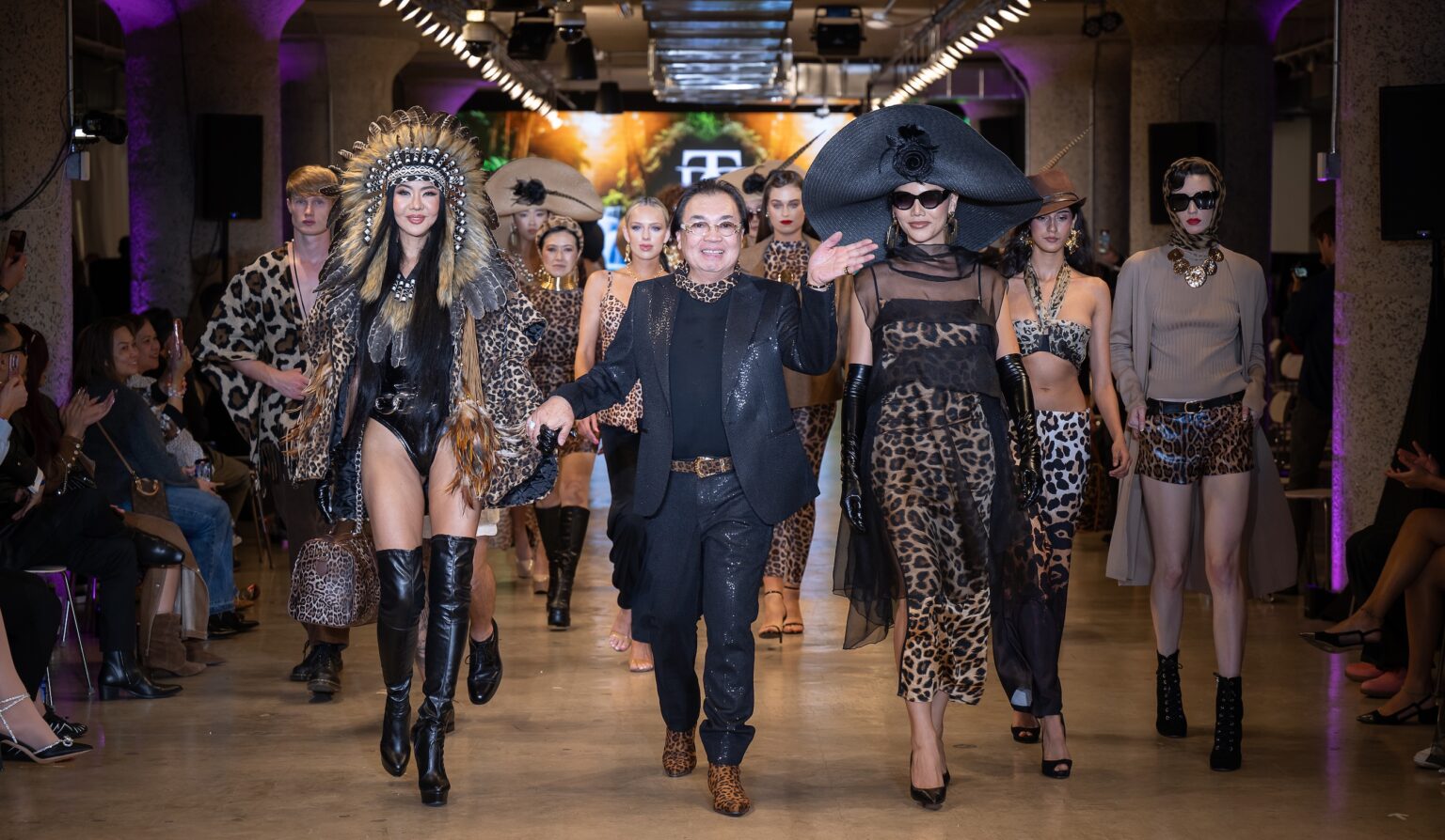 LOS ANGELES, CALIFORNIA - OCTOBER 16: Designer David Tupaz and models walk the runway at the David Tupaz show during Los Angeles Fashion Week Powered By Art Hearts Fashion at The New Mart on October 16, 2025 in Los Angeles, California. (Photo by Mark Gunter/Getty Images for Art Hearts Fashion)