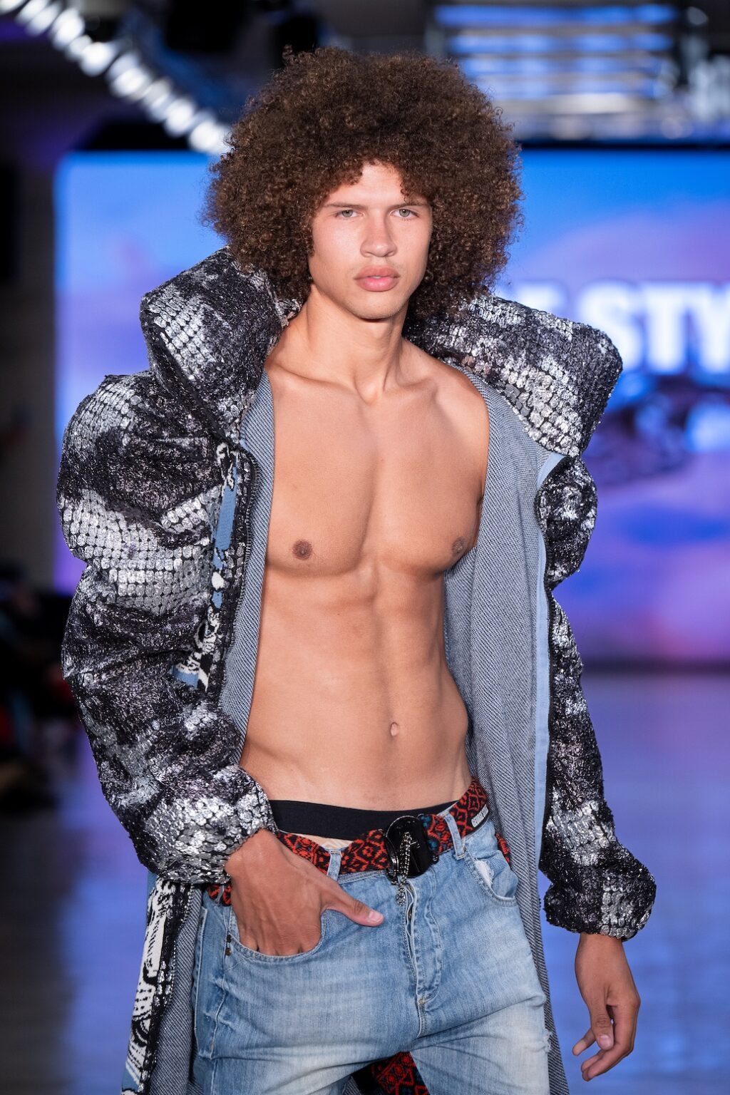 LOS ANGELES, CALIFORNIA - OCTOBER 17: A model walks the runway at the George Styler show during Los Angeles Fashion Week Powered By Art Hearts Fashion at The New Mart on October 17, 2025 in Los Angeles, California. (Photo by Mark Gunter/Getty Images for Art Hearts Fashion)
