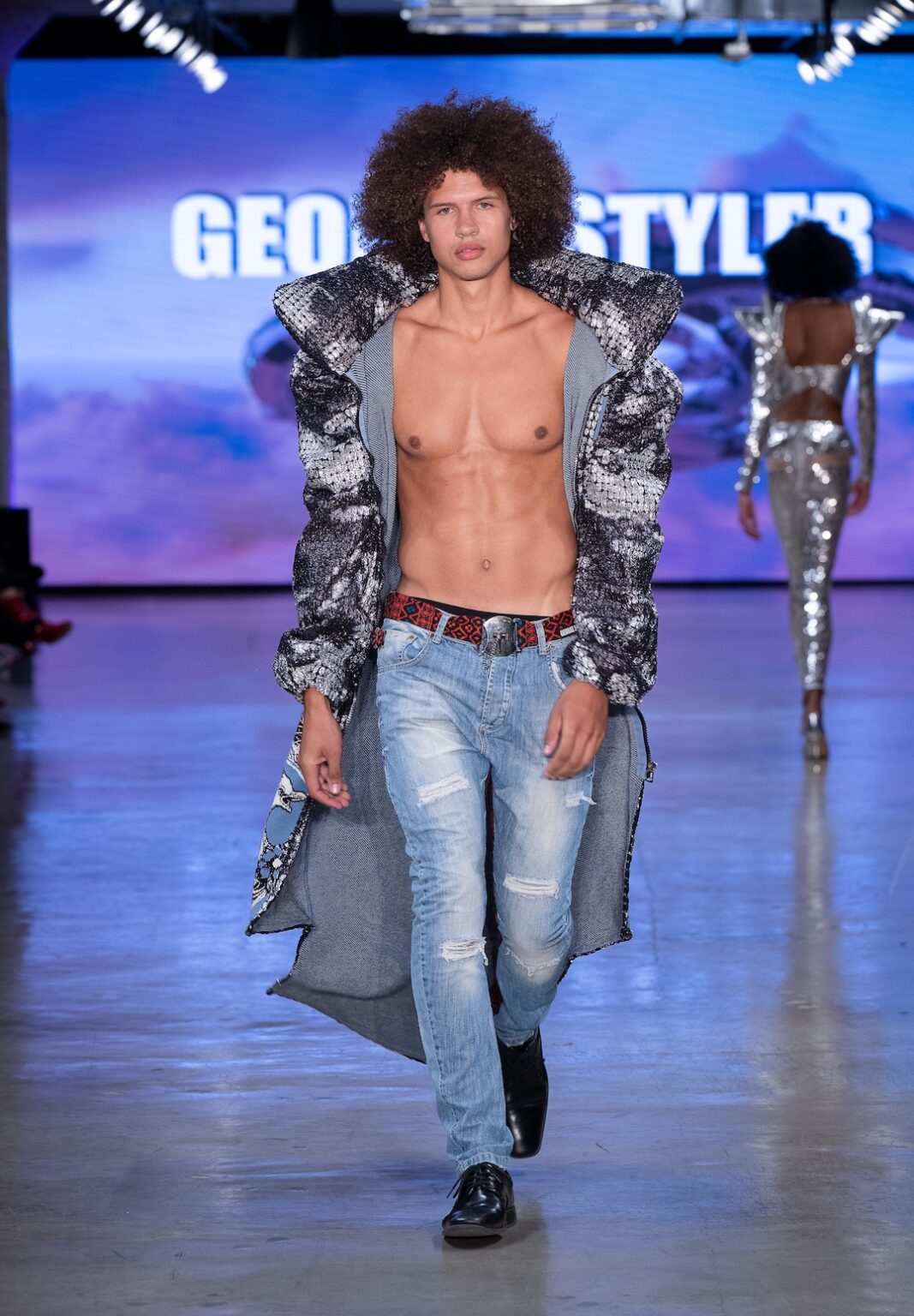 LOS ANGELES, CALIFORNIA - OCTOBER 17: A model walks the runway at the George Styler show during Los Angeles Fashion Week Powered By Art Hearts Fashion at The New Mart on October 17, 2025 in Los Angeles, California. (Photo by Mark Gunter/Getty Images for Art Hearts Fashion)