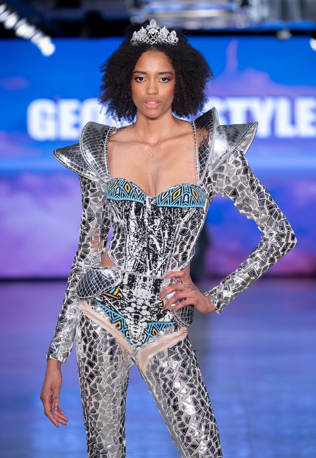 LOS ANGELES, CALIFORNIA - OCTOBER 17: A model walks the runway at the George Styler show during Los Angeles Fashion Week Powered By Art Hearts Fashion at The New Mart on October 17, 2025 in Los Angeles, California. (Photo by Mark Gunter/Getty Images for Art Hearts Fashion)