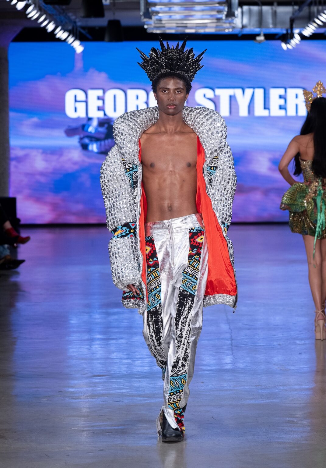 LOS ANGELES, CALIFORNIA - OCTOBER 17: A model walks the runway at the George Styler show during Los Angeles Fashion Week Powered By Art Hearts Fashion at The New Mart on October 17, 2025 in Los Angeles, California. (Photo by Mark Gunter/Getty Images for Art Hearts Fashion)