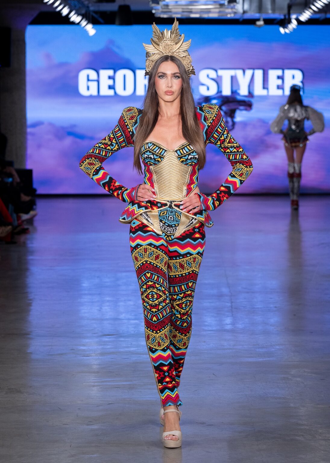 LOS ANGELES, CALIFORNIA - OCTOBER 17: A model walks the runway at the George Styler show during Los Angeles Fashion Week Powered By Art Hearts Fashion at The New Mart on October 17, 2025 in Los Angeles, California. (Photo by Mark Gunter/Getty Images for Art Hearts Fashion)