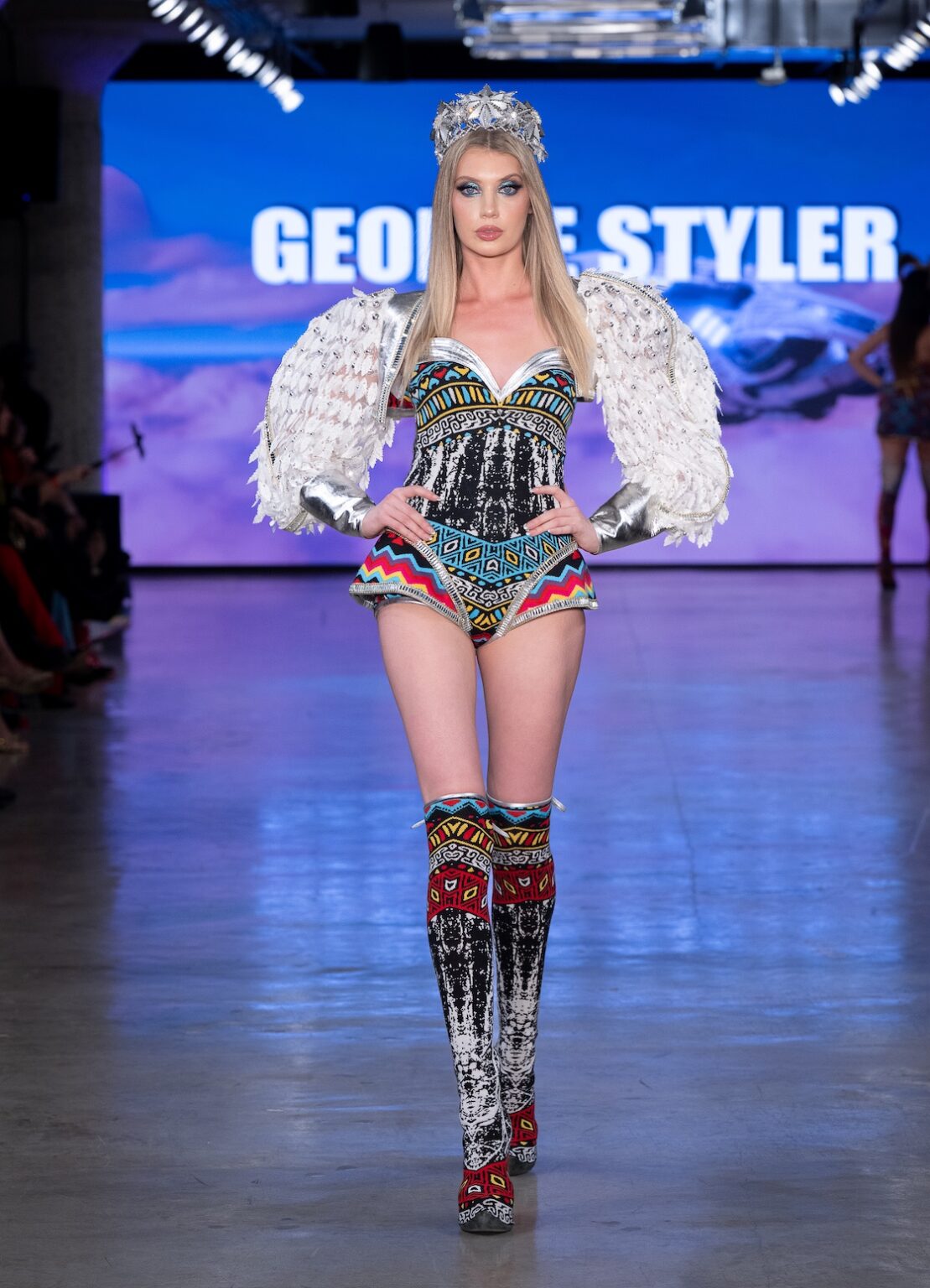 LOS ANGELES, CALIFORNIA - OCTOBER 17: A model walks the runway at the George Styler show during Los Angeles Fashion Week Powered By Art Hearts Fashion at The New Mart on October 17, 2025 in Los Angeles, California. (Photo by Mark Gunter/Getty Images for Art Hearts Fashion)