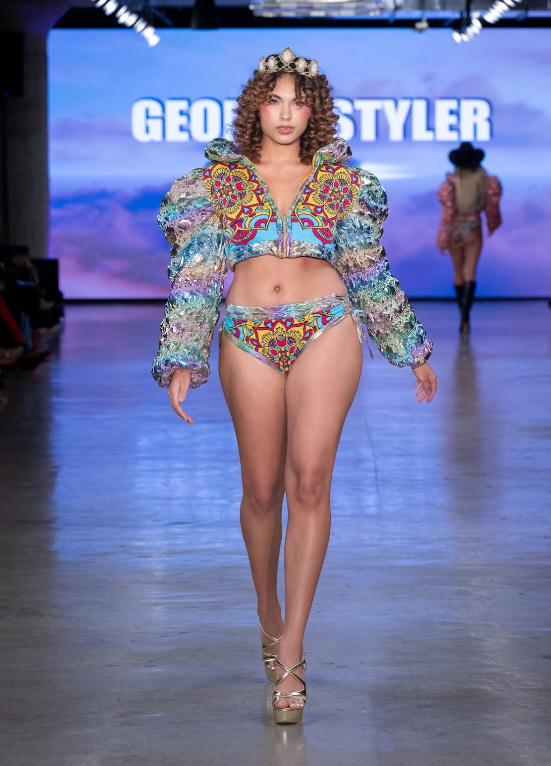 LOS ANGELES, CALIFORNIA - OCTOBER 17: A model walks the runway at the George Styler show during Los Angeles Fashion Week Powered By Art Hearts Fashion at The New Mart on October 17, 2025 in Los Angeles, California. (Photo by Mark Gunter/Getty Images for Art Hearts Fashion)