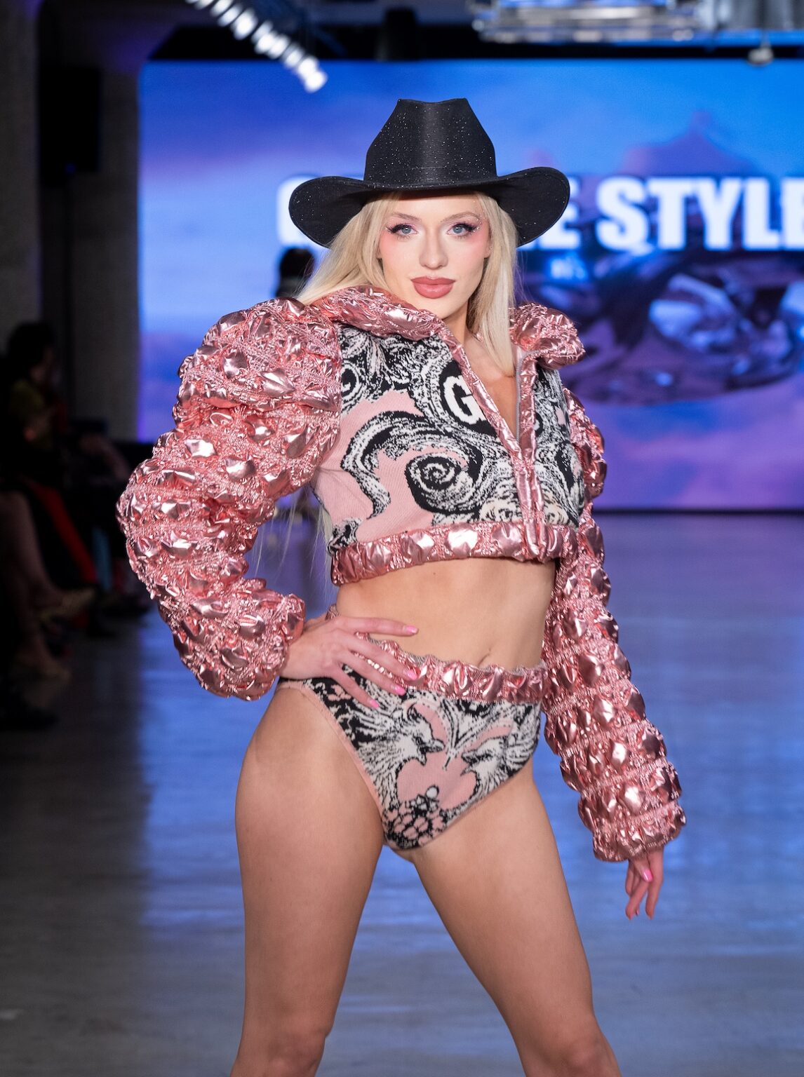 LOS ANGELES, CALIFORNIA - OCTOBER 17: A model walks the runway at the George Styler show during Los Angeles Fashion Week Powered By Art Hearts Fashion at The New Mart on October 17, 2025 in Los Angeles, California. (Photo by Mark Gunter/Getty Images for Art Hearts Fashion)