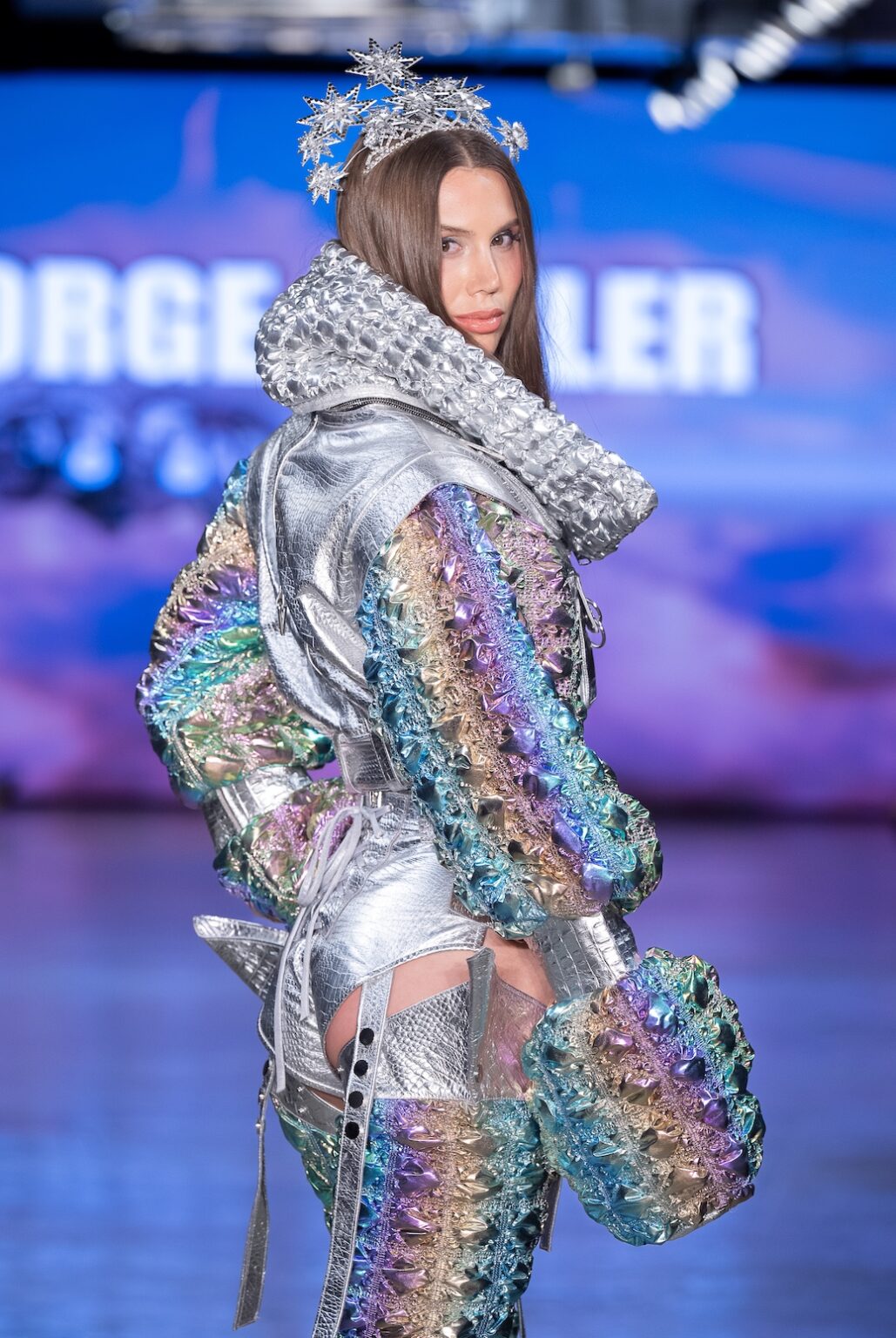 LOS ANGELES, CALIFORNIA - OCTOBER 17: A model walks the runway at the George Styler show during Los Angeles Fashion Week Powered By Art Hearts Fashion at The New Mart on October 17, 2025 in Los Angeles, California. (Photo by Mark Gunter/Getty Images for Art Hearts Fashion)