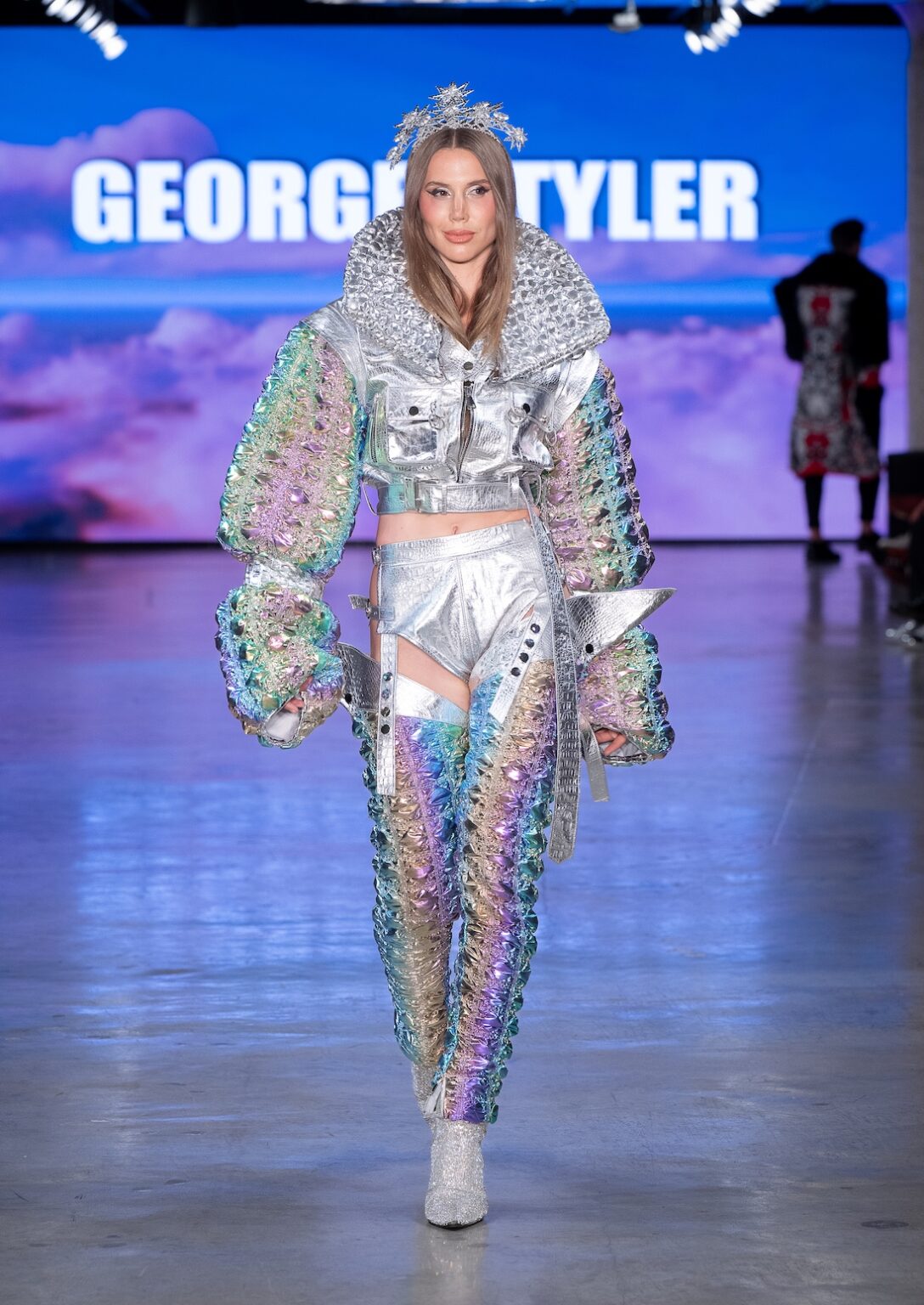 LOS ANGELES, CALIFORNIA - OCTOBER 17: A model walks the runway at the George Styler show during Los Angeles Fashion Week Powered By Art Hearts Fashion at The New Mart on October 17, 2025 in Los Angeles, California. (Photo by Mark Gunter/Getty Images for Art Hearts Fashion)