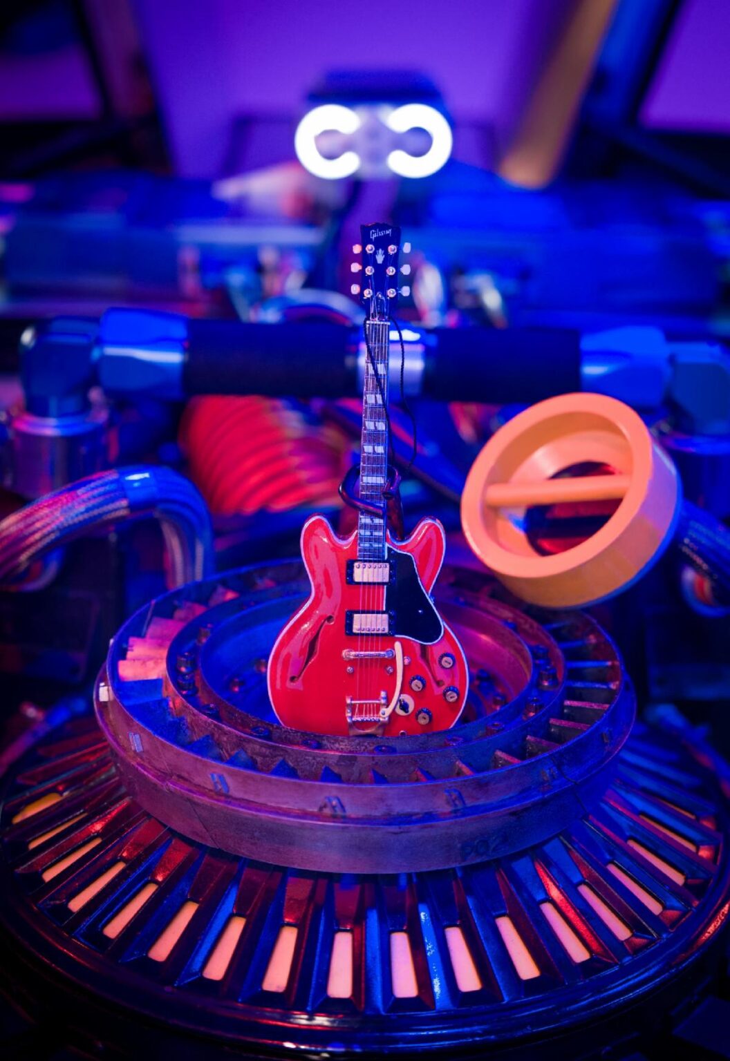 Back to the Future Collection (L-R) guitar strap and AXE Heaven mini Gibson ES-345 guitar.