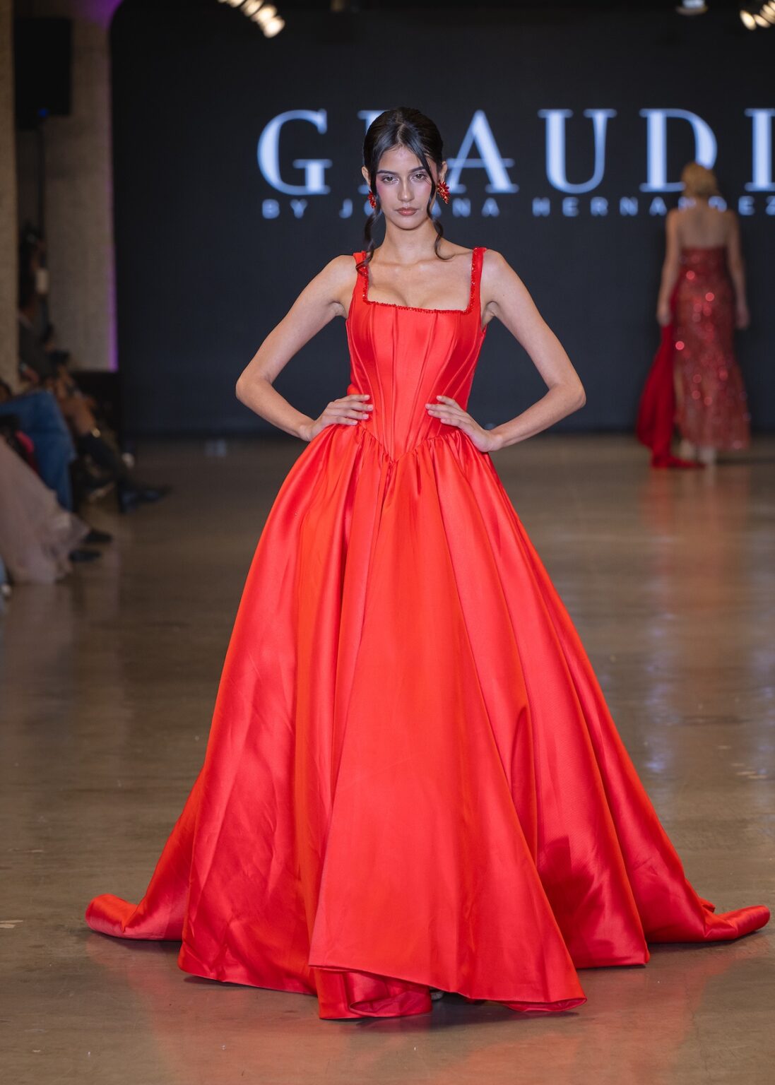 LOS ANGELES, CALIFORNIA - OCTOBER 16: A model walks the runway at the Glaudi show during Los Angeles Fashion Week Powered By Art Hearts Fashion at The New Mart on October 16, 2025 in Los Angeles, California. (Photo by Mark Gunter/Getty Images for Art Hearts Fashion)