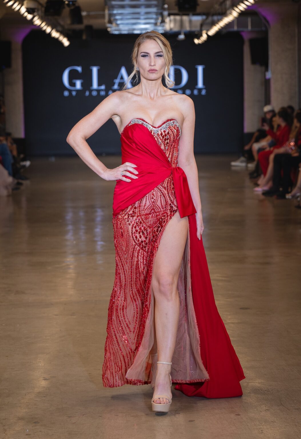 LOS ANGELES, CALIFORNIA - OCTOBER 16: A model walks the runway at the Glaudi show during Los Angeles Fashion Week Powered By Art Hearts Fashion at The New Mart on October 16, 2025 in Los Angeles, California. (Photo by Mark Gunter/Getty Images for Art Hearts Fashion)