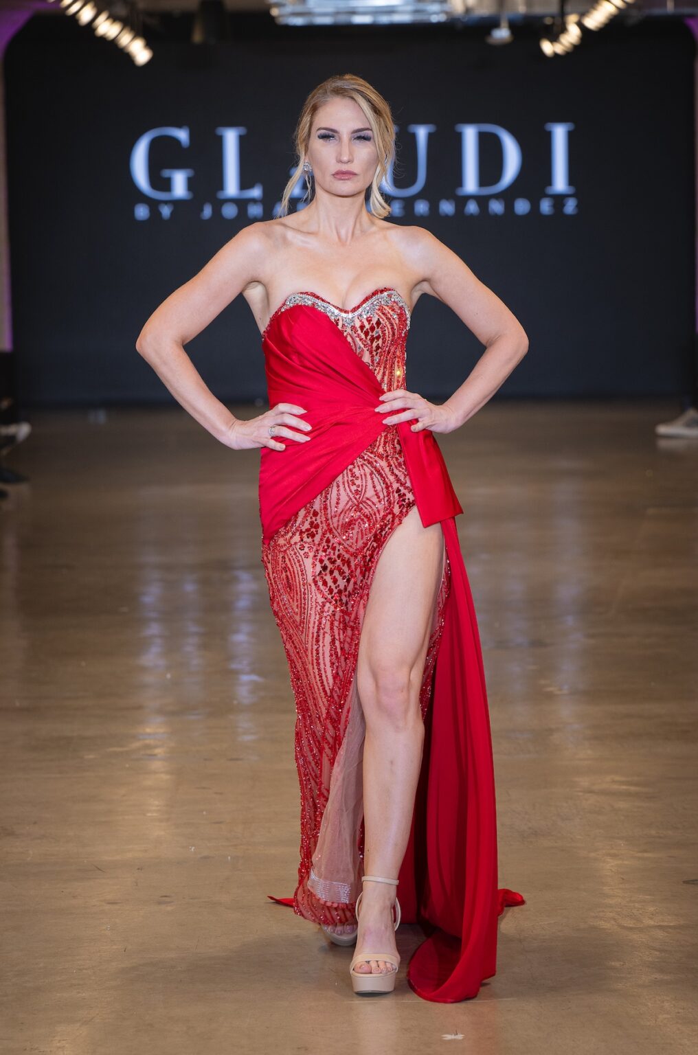 LOS ANGELES, CALIFORNIA - OCTOBER 16: A model walks the runway at the Glaudi show during Los Angeles Fashion Week Powered By Art Hearts Fashion at The New Mart on October 16, 2025 in Los Angeles, California. (Photo by Mark Gunter/Getty Images for Art Hearts Fashion)