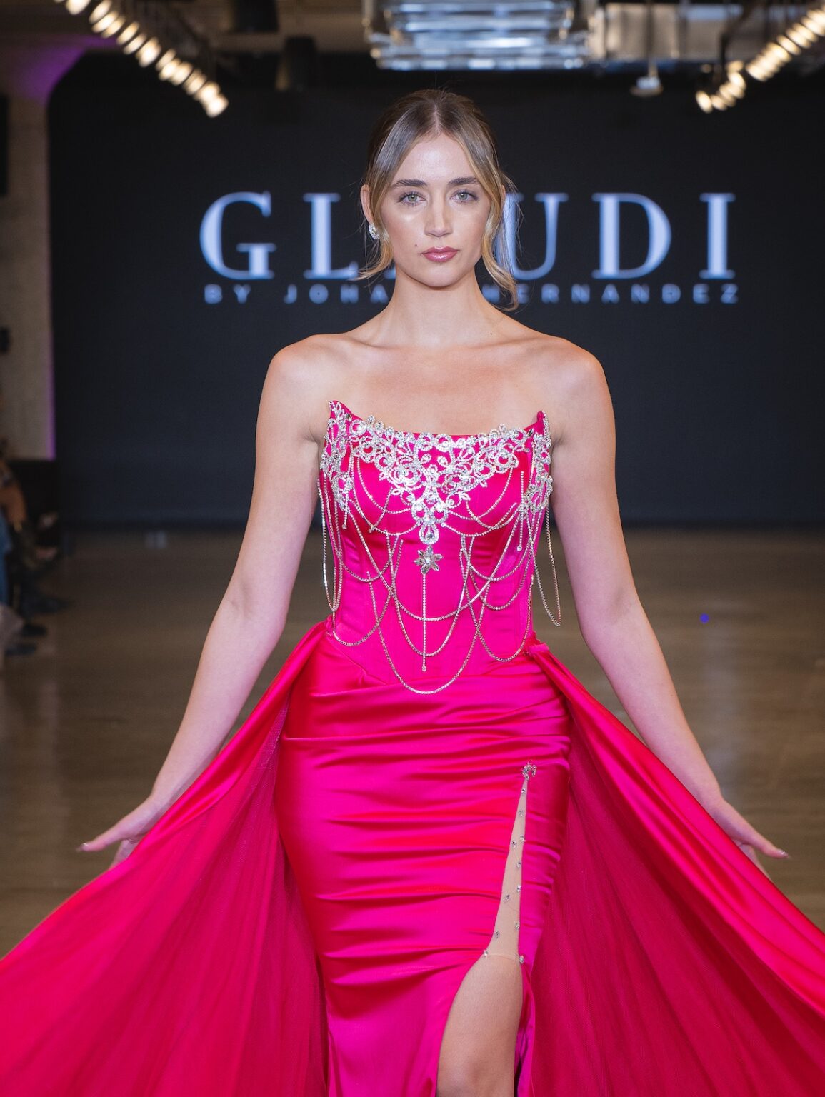 LOS ANGELES, CALIFORNIA - OCTOBER 16: A model walks the runway at the Glaudi show during Los Angeles Fashion Week Powered By Art Hearts Fashion at The New Mart on October 16, 2025 in Los Angeles, California. (Photo by Mark Gunter/Getty Images for Art Hearts Fashion)