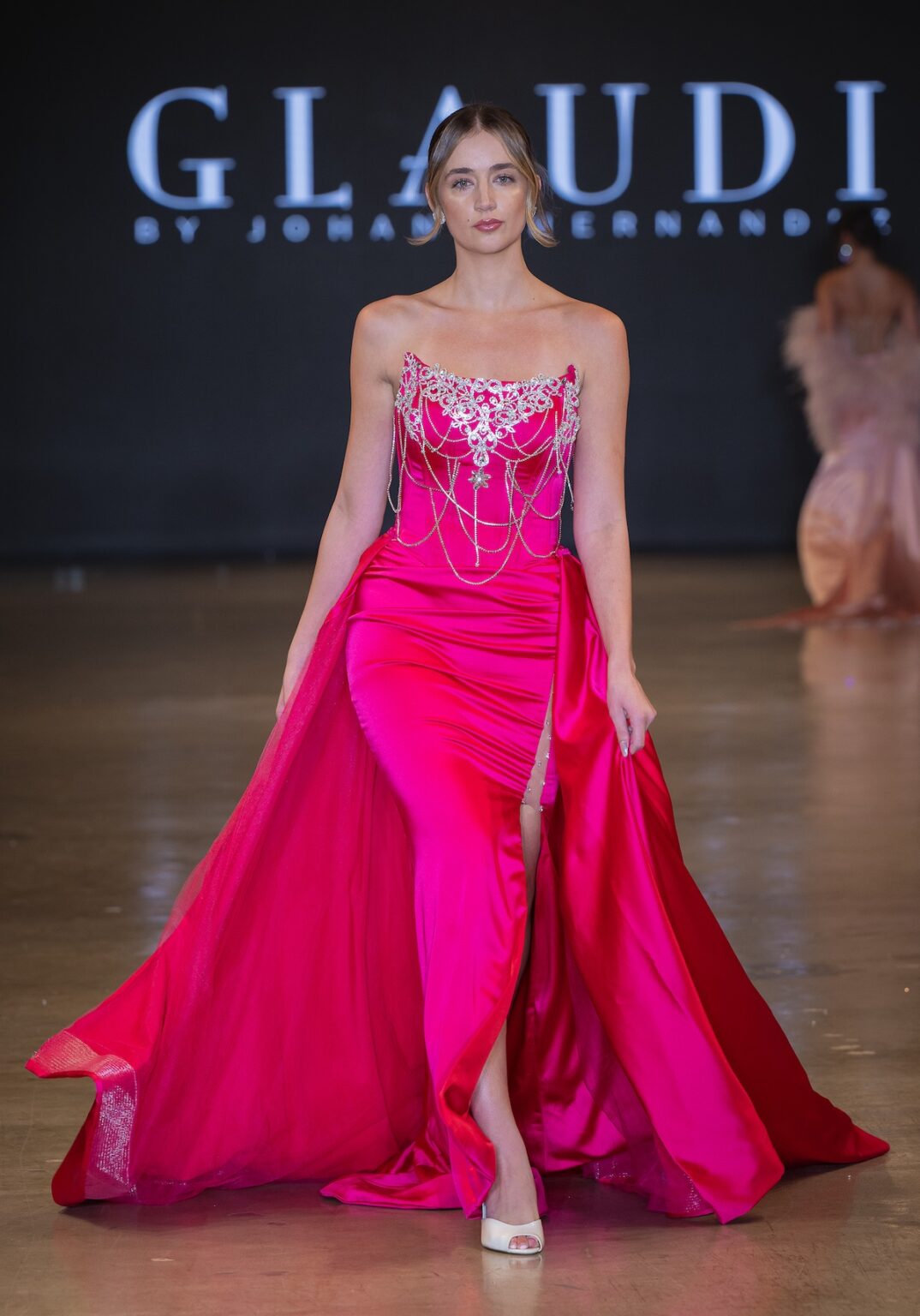 LOS ANGELES, CALIFORNIA - OCTOBER 16: A model walks the runway at the Glaudi show during Los Angeles Fashion Week Powered By Art Hearts Fashion at The New Mart on October 16, 2025 in Los Angeles, California. (Photo by Mark Gunter/Getty Images for Art Hearts Fashion)