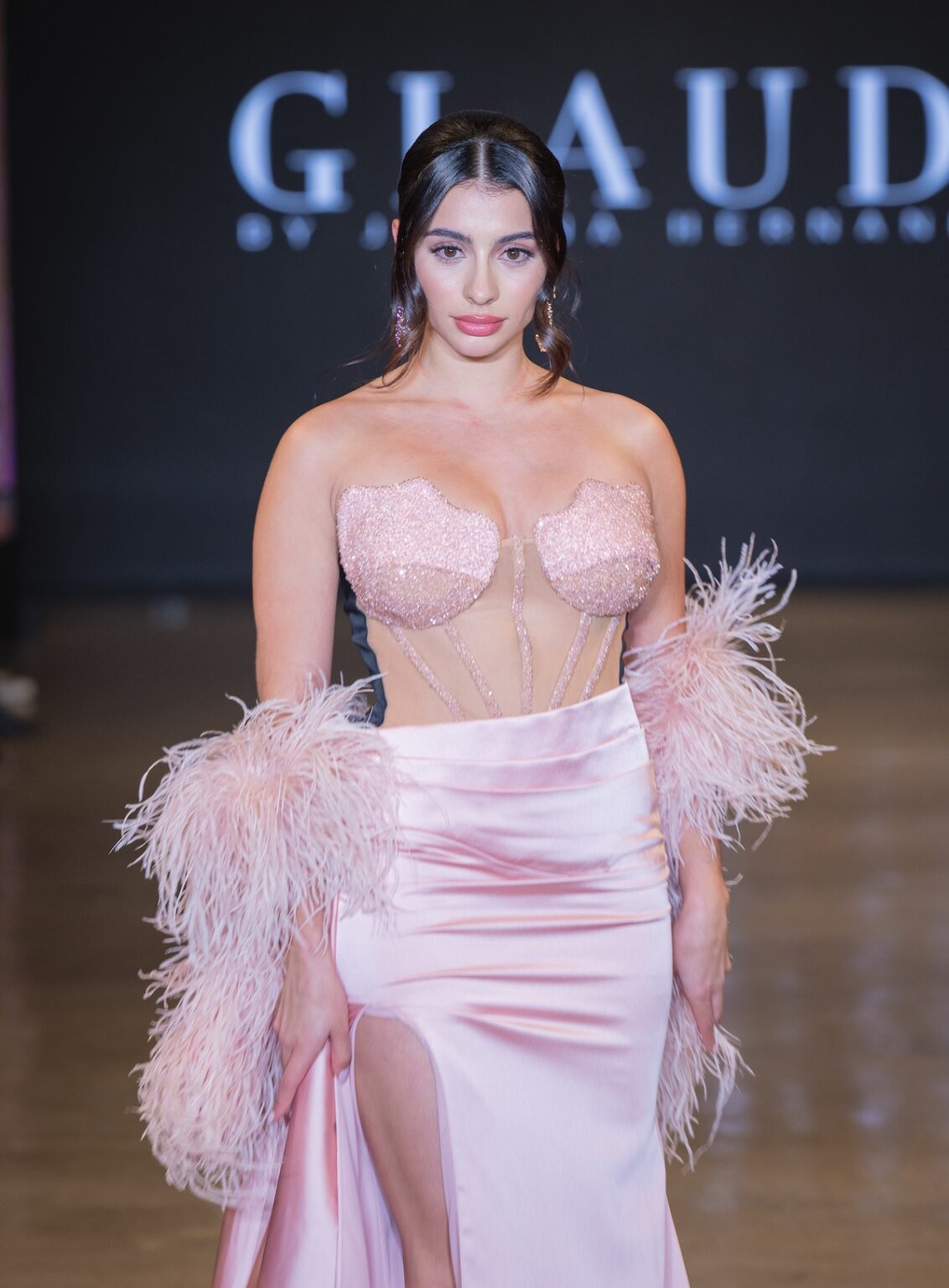 LOS ANGELES, CALIFORNIA - OCTOBER 16: A model walks the runway at the Glaudi show during Los Angeles Fashion Week Powered By Art Hearts Fashion at The New Mart on October 16, 2025 in Los Angeles, California. (Photo by Mark Gunter/Getty Images for Art Hearts Fashion)