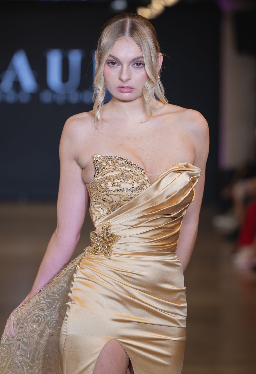 LOS ANGELES, CALIFORNIA - OCTOBER 16: A model walks the runway at the Glaudi show during Los Angeles Fashion Week Powered By Art Hearts Fashion at The New Mart on October 16, 2025 in Los Angeles, California. (Photo by Mark Gunter/Getty Images for Art Hearts Fashion)