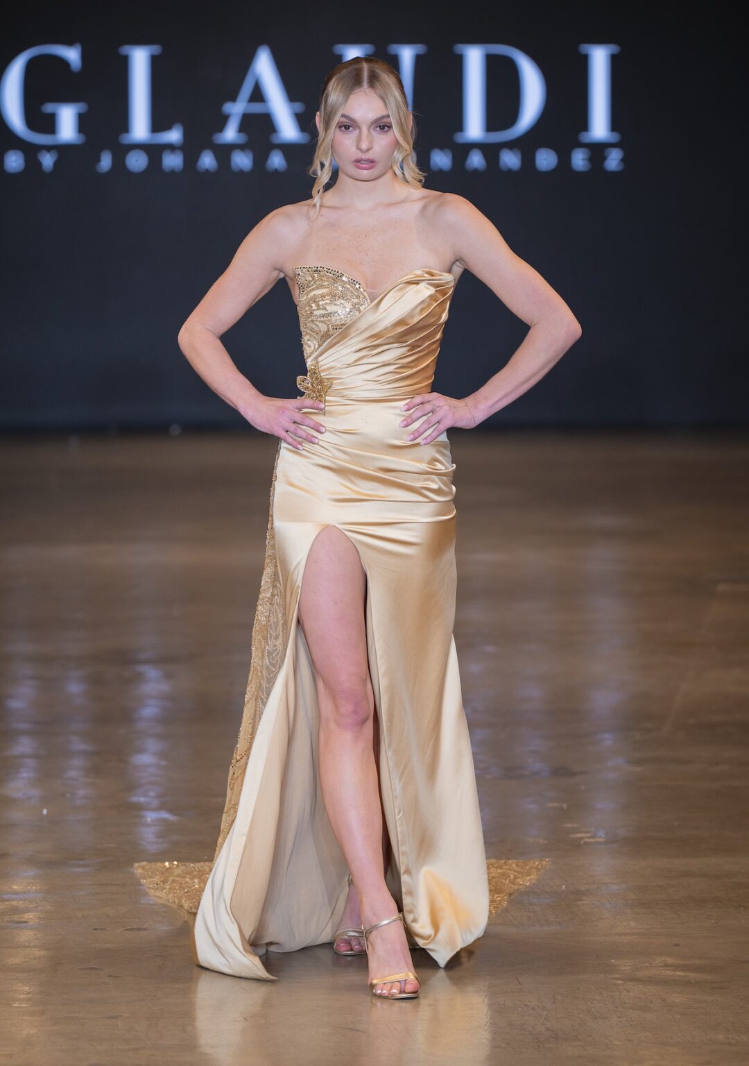 LOS ANGELES, CALIFORNIA - OCTOBER 16: A model walks the runway at the Glaudi show during Los Angeles Fashion Week Powered By Art Hearts Fashion at The New Mart on October 16, 2025 in Los Angeles, California. (Photo by Mark Gunter/Getty Images for Art Hearts Fashion)
