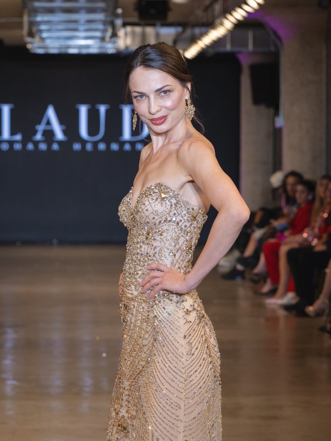 LOS ANGELES, CALIFORNIA - OCTOBER 16: A model walks the runway at the Glaudi show during Los Angeles Fashion Week Powered By Art Hearts Fashion at The New Mart on October 16, 2025 in Los Angeles, California. (Photo by Mark Gunter/Getty Images for Art Hearts Fashion)