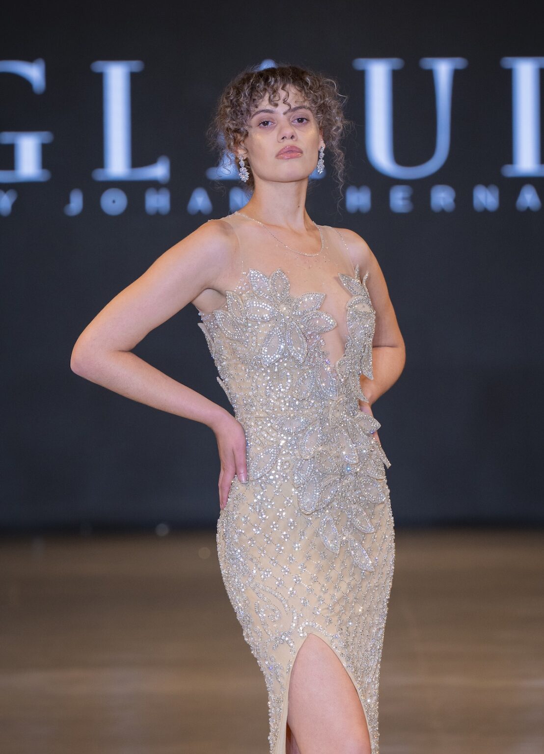 LOS ANGELES, CALIFORNIA - OCTOBER 16: A model walks the runway at the Glaudi show during Los Angeles Fashion Week Powered By Art Hearts Fashion at The New Mart on October 16, 2025 in Los Angeles, California. (Photo by Mark Gunter/Getty Images for Art Hearts Fashion)