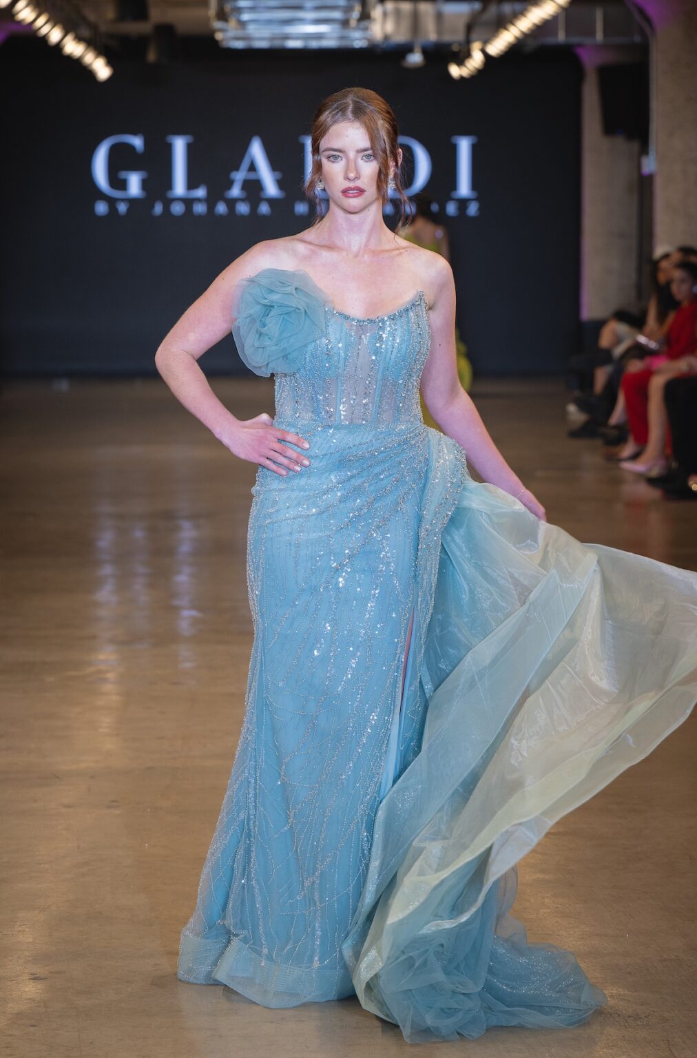 LOS ANGELES, CALIFORNIA - OCTOBER 16: A model walks the runway at the Glaudi show during Los Angeles Fashion Week Powered By Art Hearts Fashion at The New Mart on October 16, 2025 in Los Angeles, California. (Photo by Mark Gunter/Getty Images for Art Hearts Fashion)