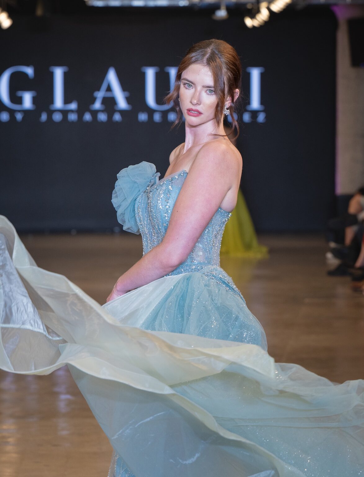 LOS ANGELES, CALIFORNIA - OCTOBER 16: A model walks the runway at the Glaudi show during Los Angeles Fashion Week Powered By Art Hearts Fashion at The New Mart on October 16, 2025 in Los Angeles, California. (Photo by Mark Gunter/Getty Images for Art Hearts Fashion)