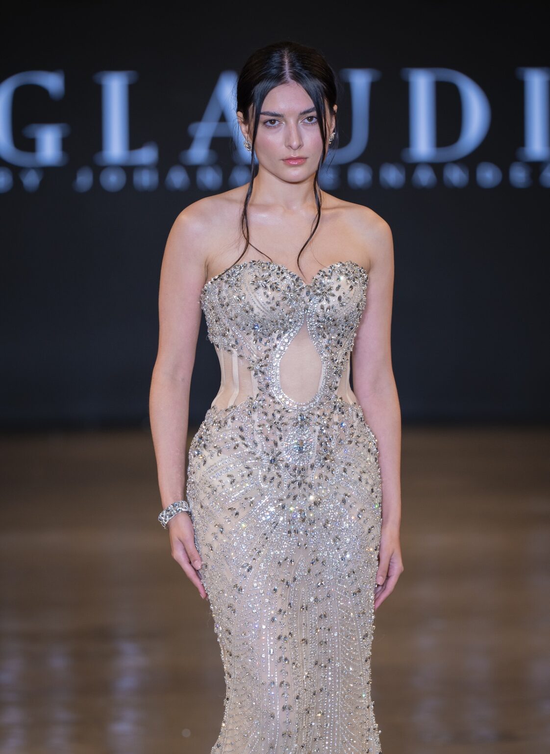LOS ANGELES, CALIFORNIA - OCTOBER 16: A model walks the runway at the Glaudi show during Los Angeles Fashion Week Powered By Art Hearts Fashion at The New Mart on October 16, 2025 in Los Angeles, California. (Photo by Mark Gunter/Getty Images for Art Hearts Fashion)