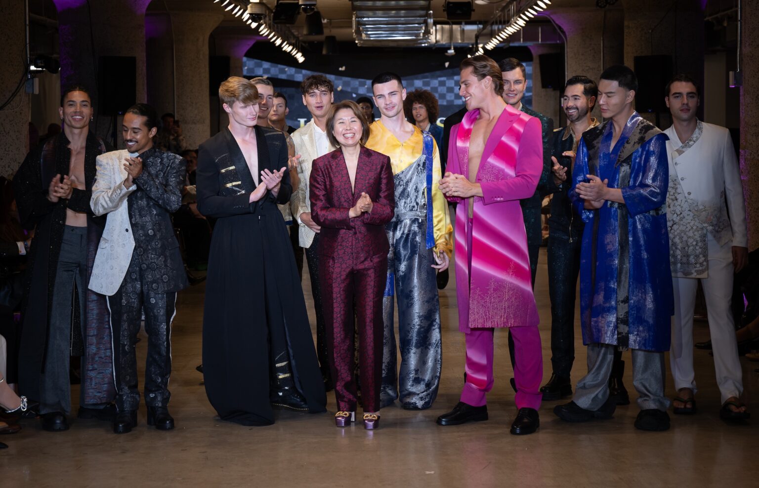 LOS ANGELES, CALIFORNIA - OCTOBER 16: Designer Hiromi Asai and models walk the runway at the Hiromi Asai show during Los Angeles Fashion Week Powered By Art Hearts Fashion at The New Mart on October 16, 2025 in Los Angeles, California. (Photo by Mark Gunter/Getty Images for Art Hearts Fashion)