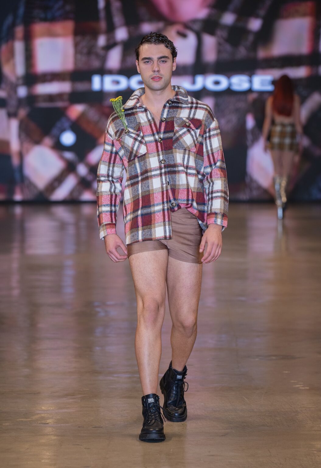 LOS ANGELES, CALIFORNIA - OCTOBER 16: A model walks the runway at the Idol Jose show during Los Angeles Fashion Week Powered By Art Hearts Fashion at The New Mart on October 16, 2025 in Los Angeles, California. (Photo by Mark Gunter/Getty Images for Art Hearts Fashion)