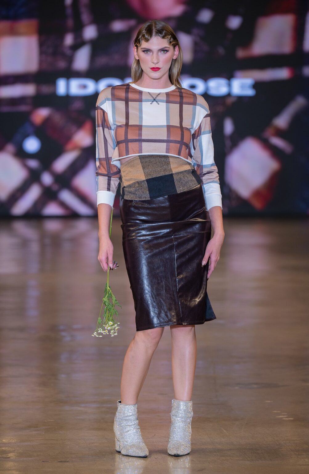 LOS ANGELES, CALIFORNIA - OCTOBER 16: A model walks the runway at the Idol Jose show during Los Angeles Fashion Week Powered By Art Hearts Fashion at The New Mart on October 16, 2025 in Los Angeles, California. (Photo by Mark Gunter/Getty Images for Art Hearts Fashion)