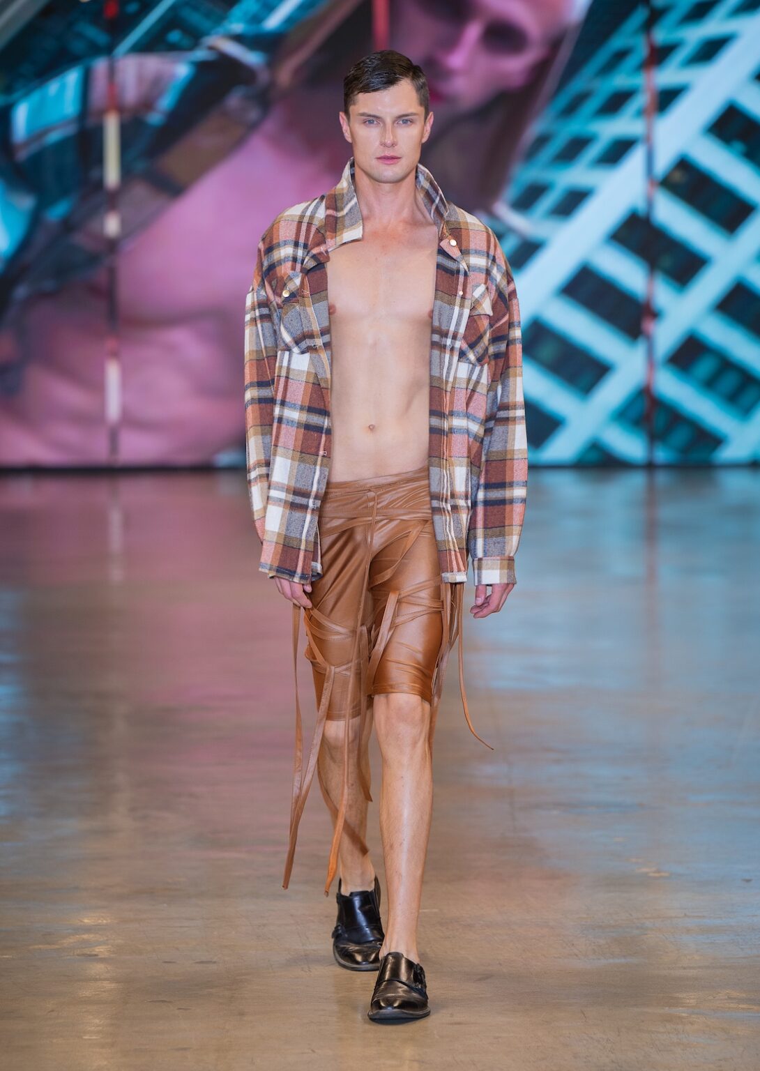 LOS ANGELES, CALIFORNIA - OCTOBER 16: A model walks the runway at the Idol Jose show during Los Angeles Fashion Week Powered By Art Hearts Fashion at The New Mart on October 16, 2025 in Los Angeles, California. (Photo by Mark Gunter/Getty Images for Art Hearts Fashion)