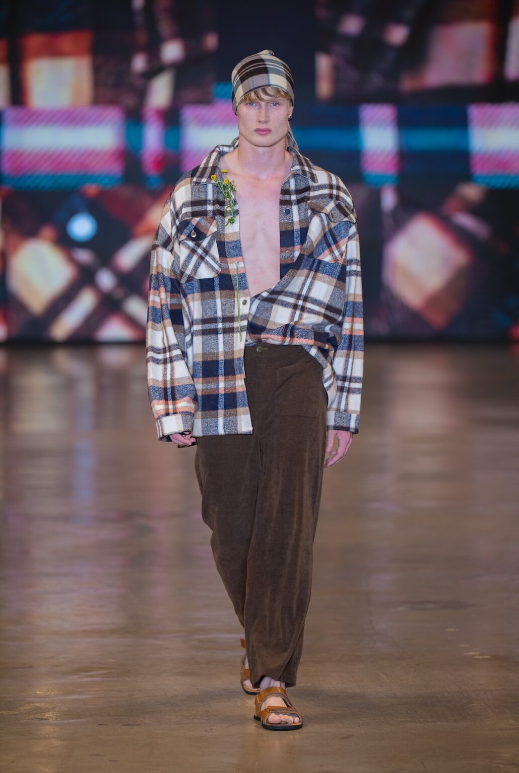 LOS ANGELES, CALIFORNIA - OCTOBER 16: A model walks the runway at the Idol Jose show during Los Angeles Fashion Week Powered By Art Hearts Fashion at The New Mart on October 16, 2025 in Los Angeles, California. (Photo by Mark Gunter/Getty Images for Art Hearts Fashion)