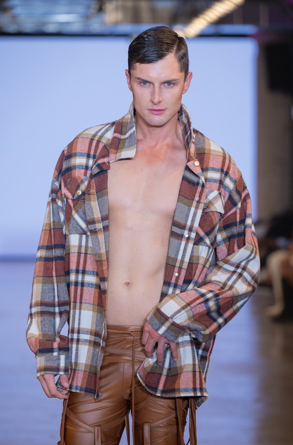 LOS ANGELES, CALIFORNIA - OCTOBER 16: A model walks the runway at the Idol Jose show during Los Angeles Fashion Week Powered By Art Hearts Fashion at The New Mart on October 16, 2025 in Los Angeles, California. (Photo by Mark Gunter/Getty Images for Art Hearts Fashion)