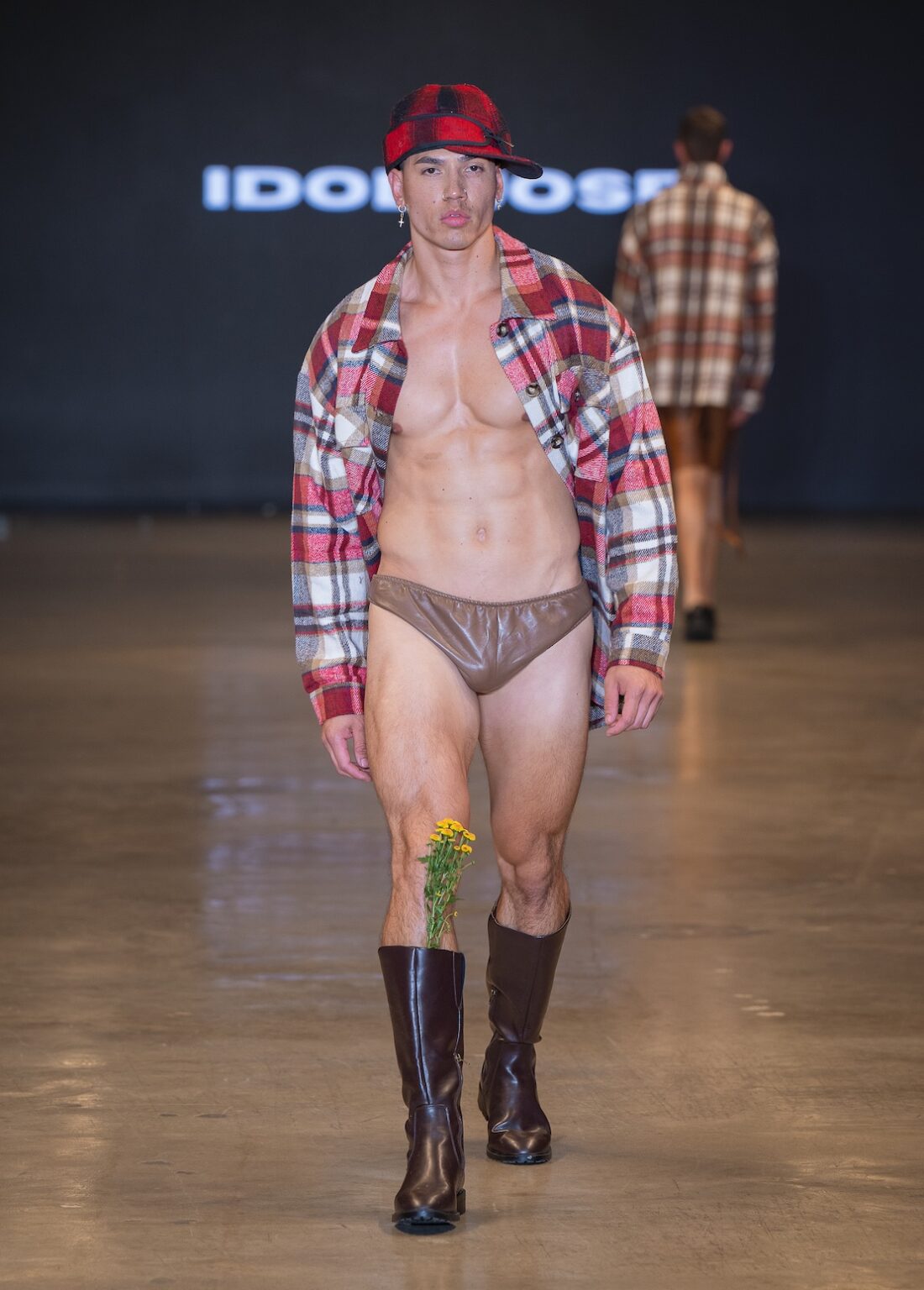 LOS ANGELES, CALIFORNIA - OCTOBER 16: A model walks the runway at the Idol Jose show during Los Angeles Fashion Week Powered By Art Hearts Fashion at The New Mart on October 16, 2025 in Los Angeles, California. (Photo by Mark Gunter/Getty Images for Art Hearts Fashion)