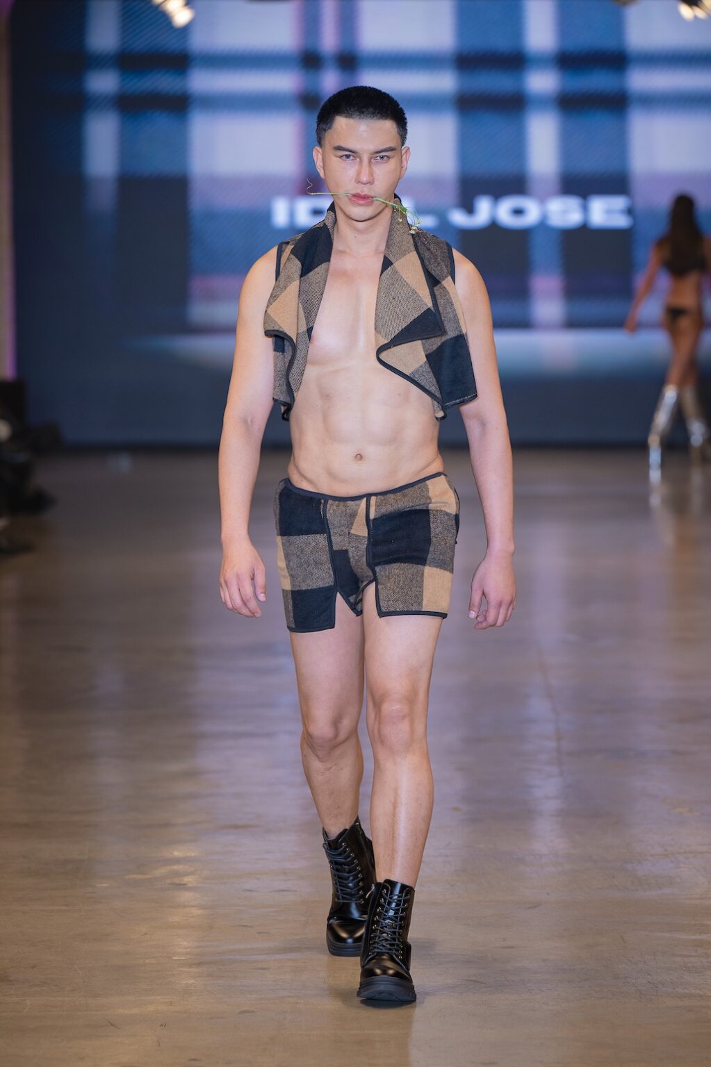 LOS ANGELES, CALIFORNIA - OCTOBER 16: A model walks the runway at the Idol Jose show during Los Angeles Fashion Week Powered By Art Hearts Fashion at The New Mart on October 16, 2025 in Los Angeles, California. (Photo by Mark Gunter/Getty Images for Art Hearts Fashion)