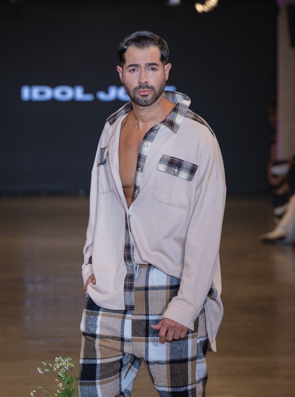 LOS ANGELES, CALIFORNIA - OCTOBER 16: A model walks the runway at the Idol Jose show during Los Angeles Fashion Week Powered By Art Hearts Fashion at The New Mart on October 16, 2025 in Los Angeles, California. (Photo by Mark Gunter/Getty Images for Art Hearts Fashion)