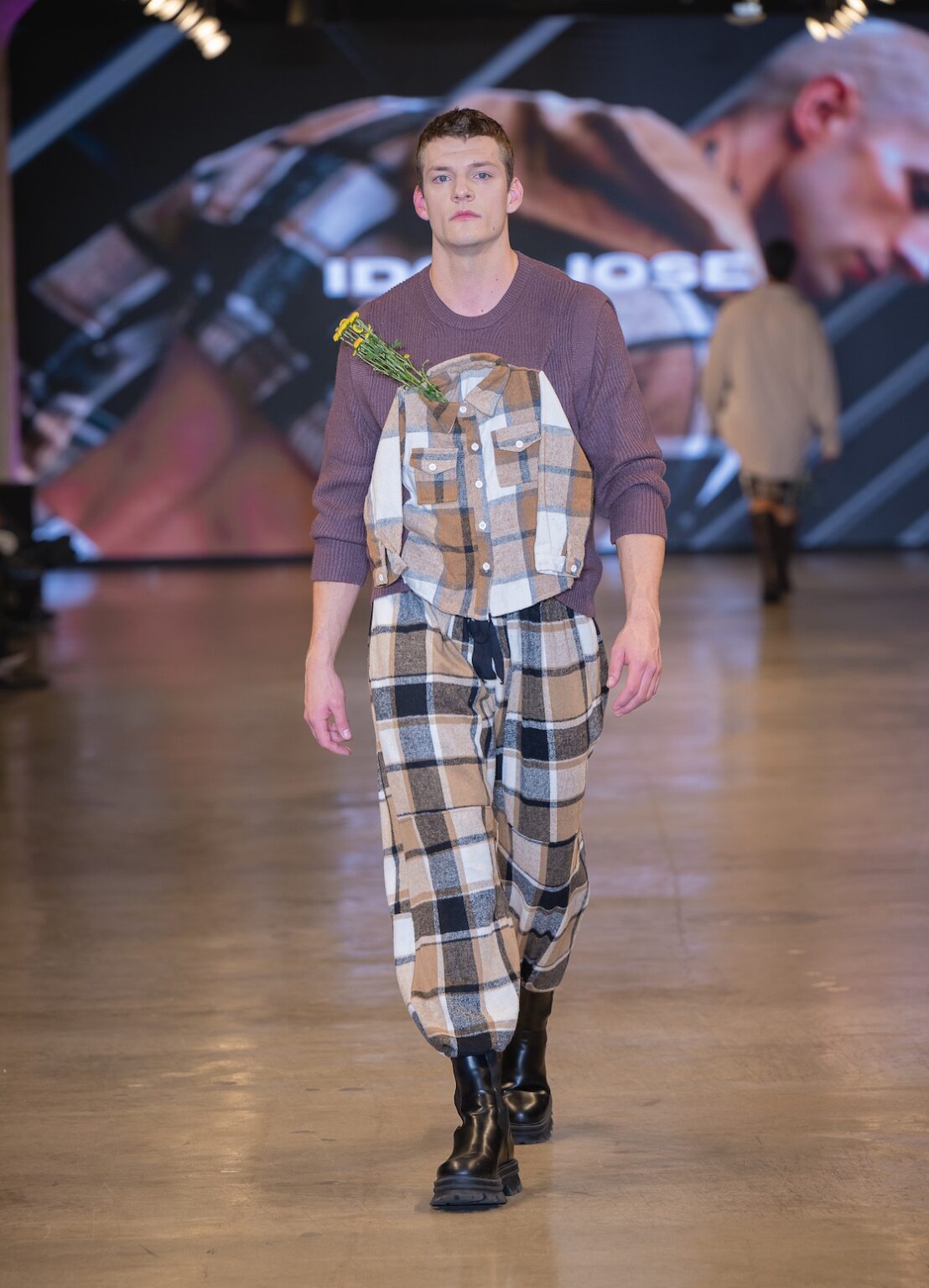 LOS ANGELES, CALIFORNIA - OCTOBER 16: A model walks the runway at the Idol Jose show during Los Angeles Fashion Week Powered By Art Hearts Fashion at The New Mart on October 16, 2025 in Los Angeles, California. (Photo by Mark Gunter/Getty Images for Art Hearts Fashion)