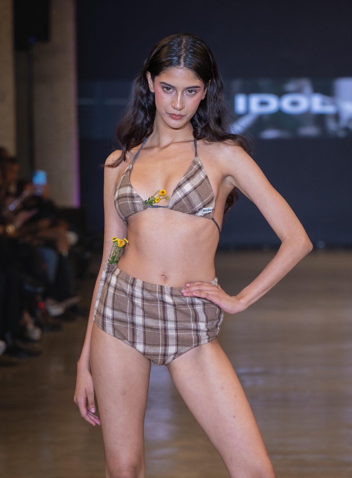LOS ANGELES, CALIFORNIA - OCTOBER 16: A model walks the runway at the Idol Jose show during Los Angeles Fashion Week Powered By Art Hearts Fashion at The New Mart on October 16, 2025 in Los Angeles, California. (Photo by Mark Gunter/Getty Images for Art Hearts Fashion)