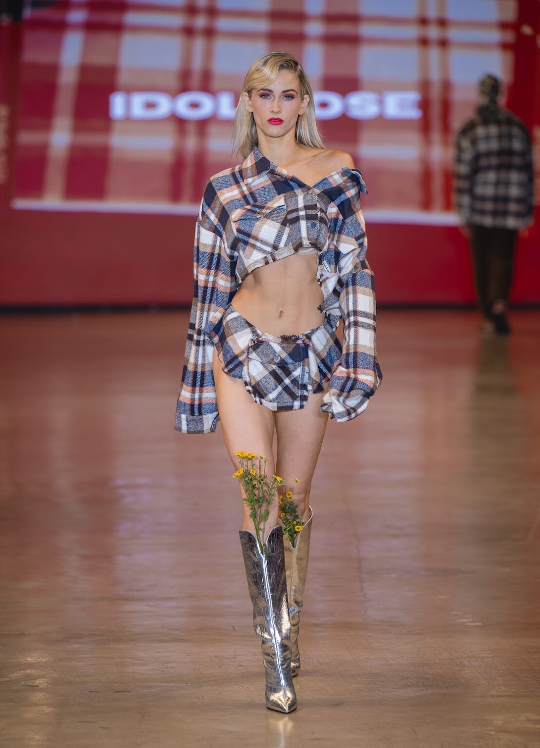 LOS ANGELES, CALIFORNIA - OCTOBER 16: A model walks the runway at the Idol Jose show during Los Angeles Fashion Week Powered By Art Hearts Fashion at The New Mart on October 16, 2025 in Los Angeles, California. (Photo by Mark Gunter/Getty Images for Art Hearts Fashion)