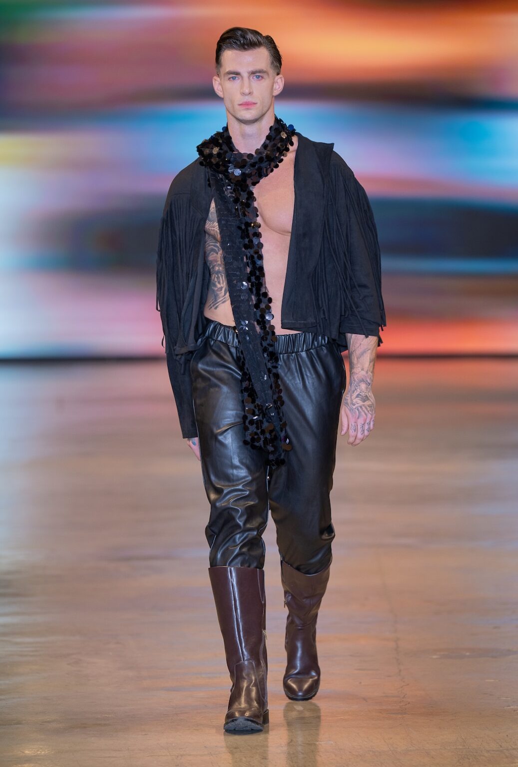 LOS ANGELES, CALIFORNIA - OCTOBER 16: A model walks the runway at the Idol Jose show during Los Angeles Fashion Week Powered By Art Hearts Fashion at The New Mart on October 16, 2025 in Los Angeles, California. (Photo by Mark Gunter/Getty Images for Art Hearts Fashion)