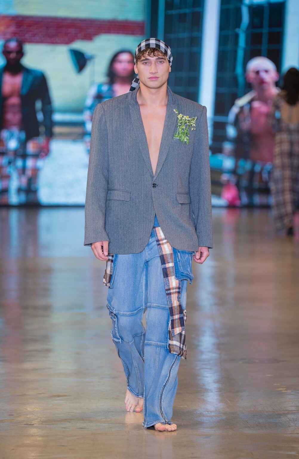 LOS ANGELES, CALIFORNIA - OCTOBER 16: Model James Barranca walks the runway at the Idol Jose show during Los Angeles Fashion Week Powered By Art Hearts Fashion at The New Mart on October 16, 2025 in Los Angeles, California. (Photo by Mark Gunter/Getty Images for Art Hearts Fashion)