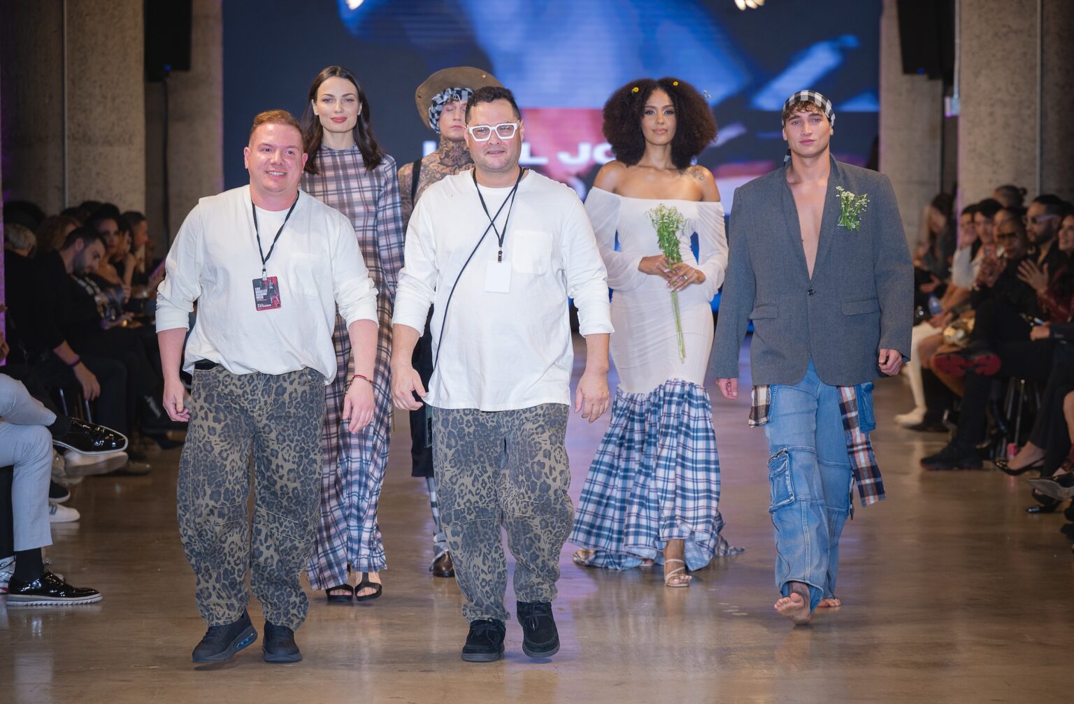 LOS ANGELES, CALIFORNIA - OCTOBER 16: Designers Idol Jose and models walk the runway at the Idol Jose show during Los Angeles Fashion Week Powered By Art Hearts Fashion at The New Mart on October 16, 2025 in Los Angeles, California. (Photo by Mark Gunter/Getty Images for Art Hearts Fashion)