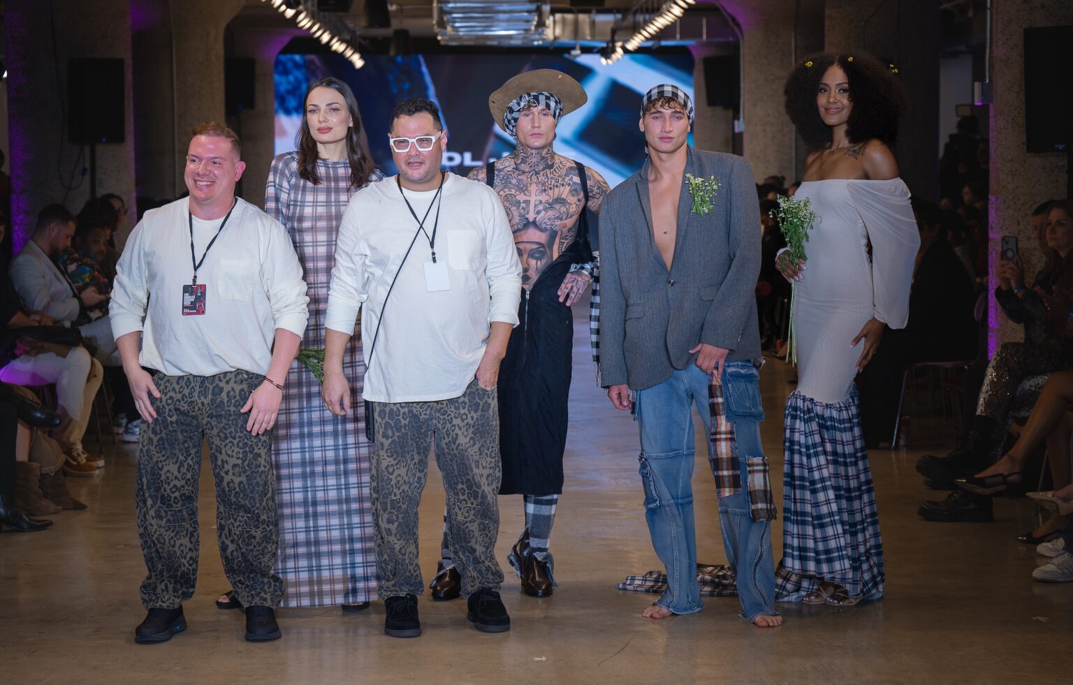 LOS ANGELES, CALIFORNIA - OCTOBER 16: Designers Idol Jose and models walk the runway at the Idol Jose show during Los Angeles Fashion Week Powered By Art Hearts Fashion at The New Mart on October 16, 2025 in Los Angeles, California. (Photo by Mark Gunter/Getty Images for Art Hearts Fashion)