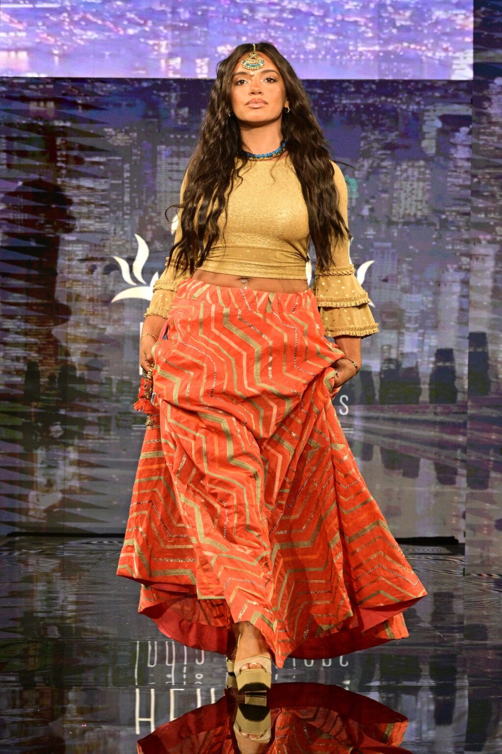 NEW YORK, NEW YORK - SEPTEMBER 11: A model walks the runway for International Heritage Fashion Week, featuring Heritage India Fashions by Prashant Goyal at The Angel Orensanz Foundation on September 11, 2025 in New York City. (Photo by Eugene Gologursky/Getty Images for Art Hearts Fashion)