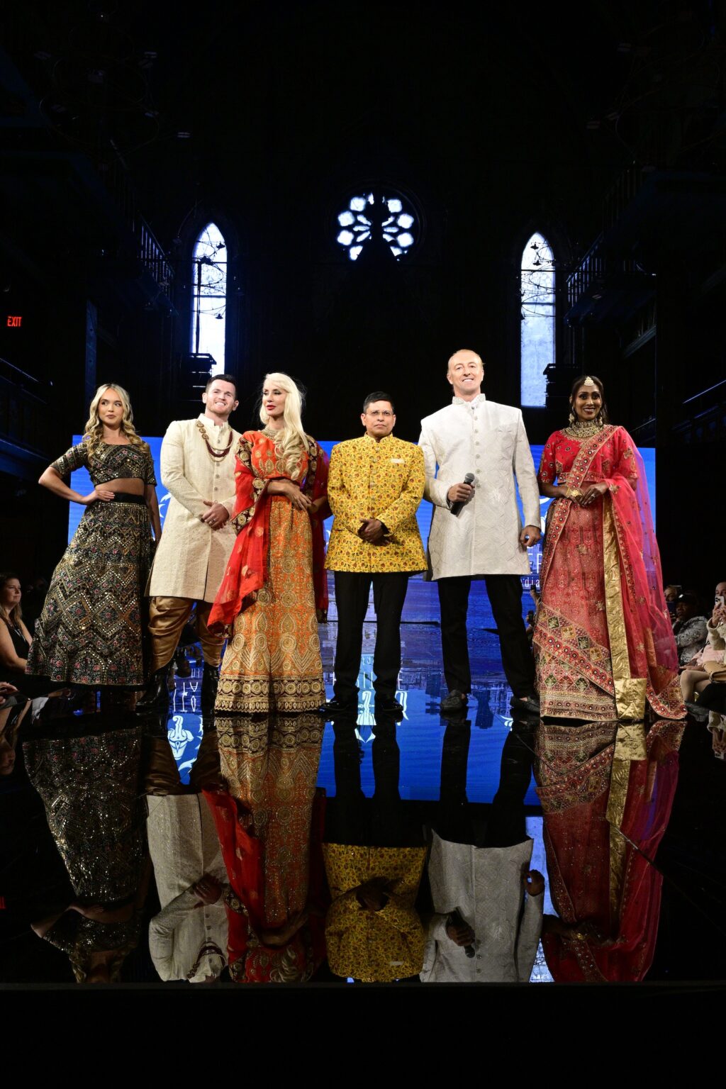 NEW YORK, NEW YORK - SEPTEMBER 11: Willow Craig, Jarred Fiorda, Baroness Tracy Turco, Prashant Goyal, HH Dr. Prince Mario-Max Schaumburg Lippe, and Nadia Neubert walk the runway for International Heritage Fashion Week, featuring Heritage India Fashions by Prashant Goyal at The Angel Orensanz Foundation on September 11, 2025 in New York City. (Photo by Eugene Gologursky/Getty Images for Art Hearts Fashion)