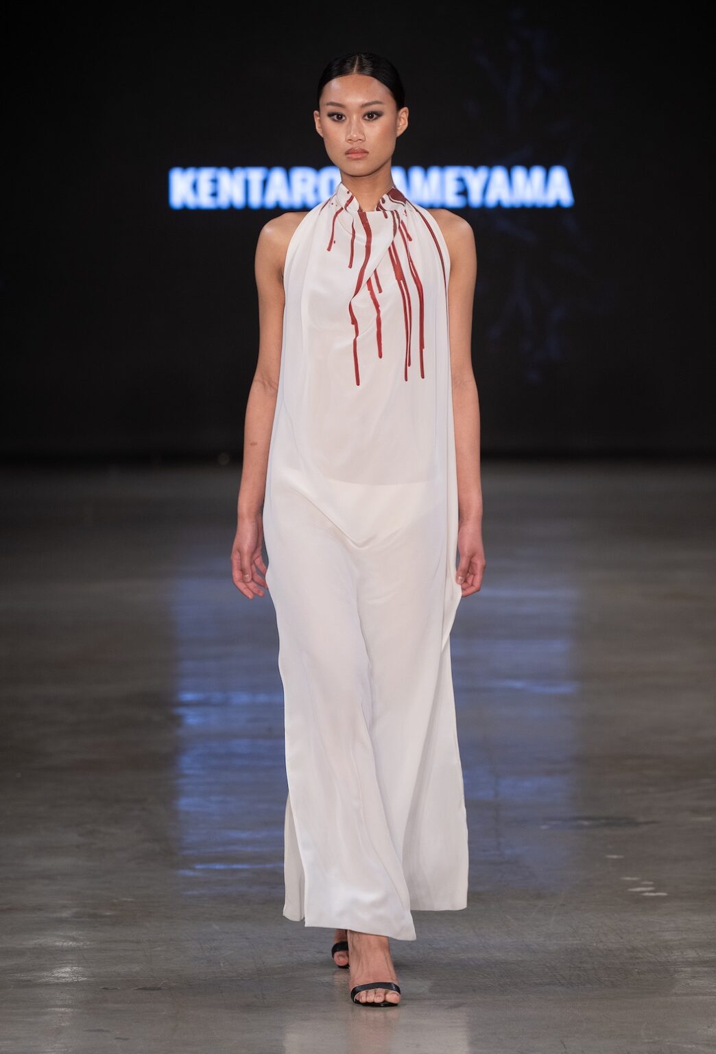 LOS ANGELES, CALIFORNIA - OCTOBER 17: A model walks the runway at the Kentaro Kameyama show during Los Angeles Fashion Week Powered By Art Hearts Fashion at The New Mart on October 17, 2025 in Los Angeles, California. (Photo by Mark Gunter/Getty Images for Art Hearts Fashion)