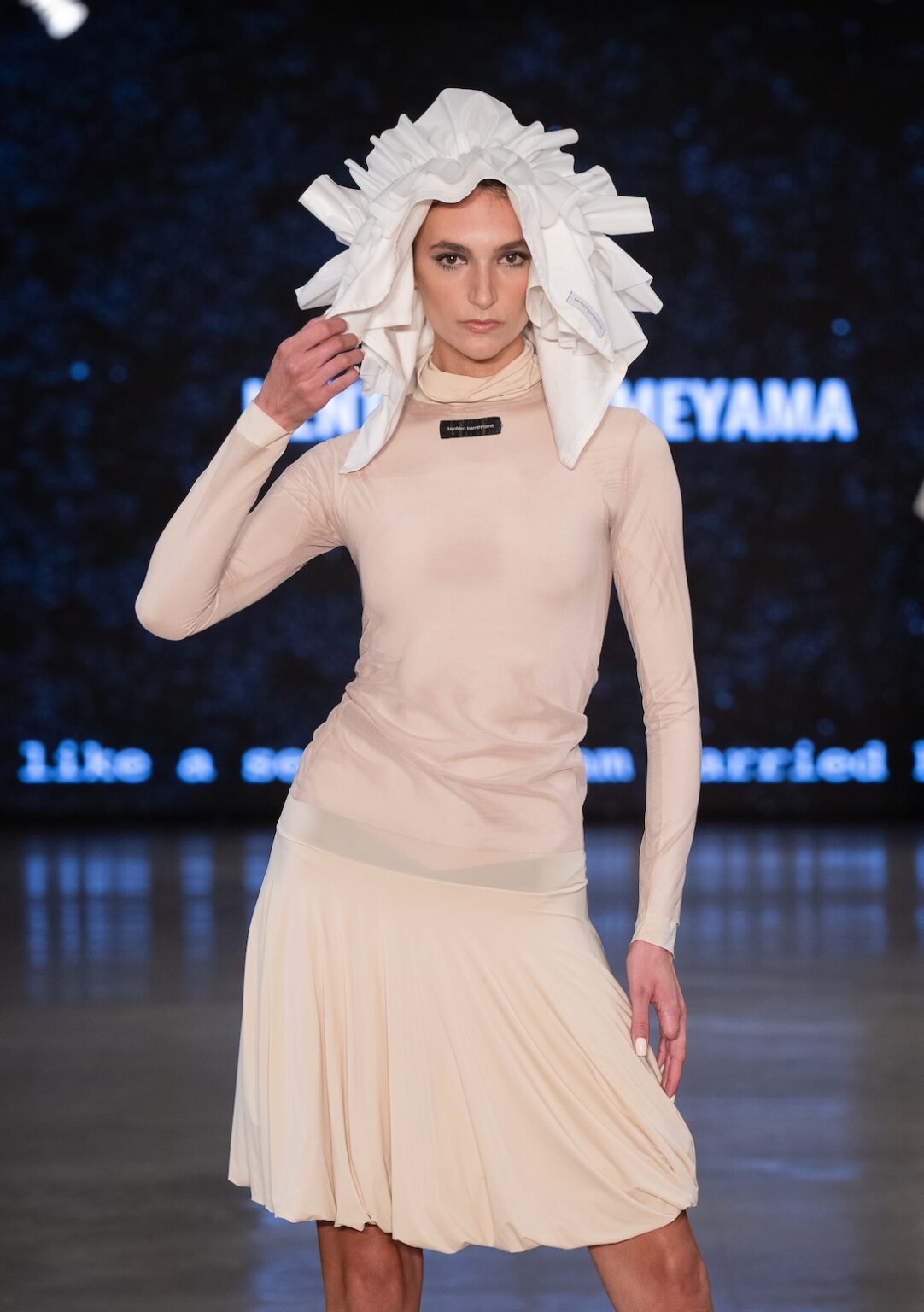 LOS ANGELES, CALIFORNIA - OCTOBER 17: A model walks the runway at the Kentaro Kameyama show during Los Angeles Fashion Week Powered By Art Hearts Fashion at The New Mart on October 17, 2025 in Los Angeles, California. (Photo by Mark Gunter/Getty Images for Art Hearts Fashion)