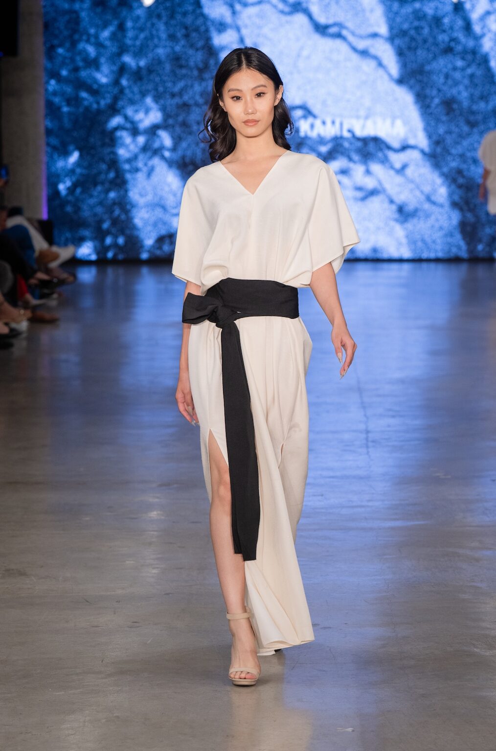 LOS ANGELES, CALIFORNIA - OCTOBER 17: A model walks the runway at the Kentaro Kameyama show during Los Angeles Fashion Week Powered By Art Hearts Fashion at The New Mart on October 17, 2025 in Los Angeles, California. (Photo by Mark Gunter/Getty Images for Art Hearts Fashion)