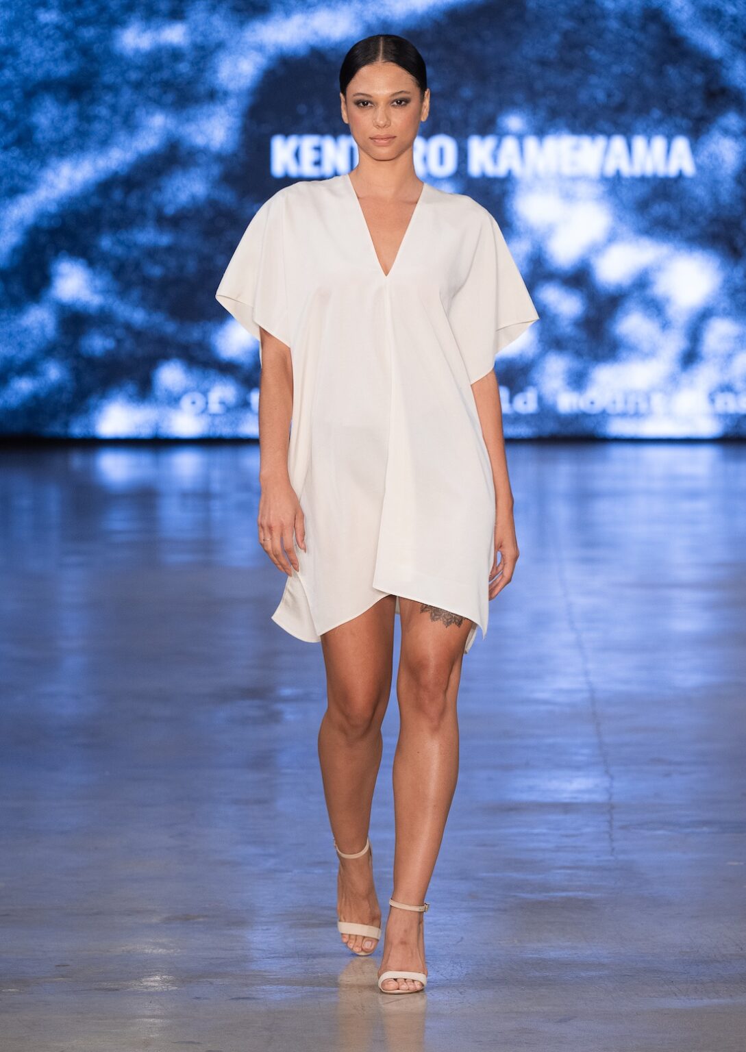 LOS ANGELES, CALIFORNIA - OCTOBER 17: A model walks the runway at the Kentaro Kameyama show during Los Angeles Fashion Week Powered By Art Hearts Fashion at The New Mart on October 17, 2025 in Los Angeles, California. (Photo by Mark Gunter/Getty Images for Art Hearts Fashion)