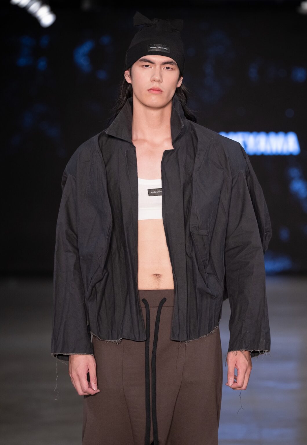 LOS ANGELES, CALIFORNIA - OCTOBER 17: A model walks the runway at the Kentaro Kameyama show during Los Angeles Fashion Week Powered By Art Hearts Fashion at The New Mart on October 17, 2025 in Los Angeles, California. (Photo by Mark Gunter/Getty Images for Art Hearts Fashion)